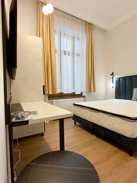 Magheru: 5 camere cu bai proprii-business regim hotelier care deja produce