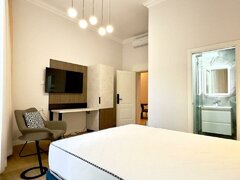 Magheru: 5 camere cu bai proprii-business regim hotelier care deja produce